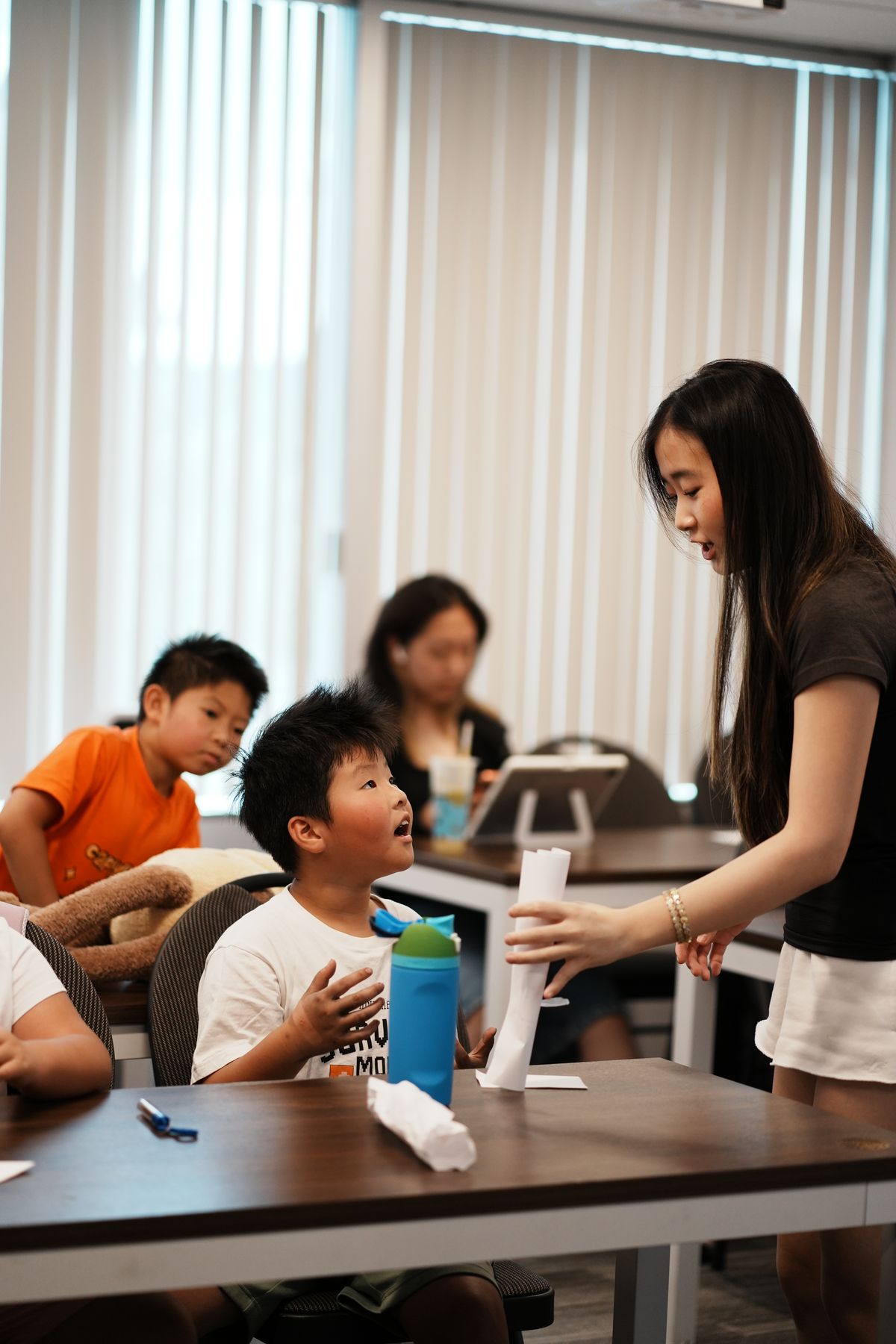 Sarah teaching a student at STEM Camp
